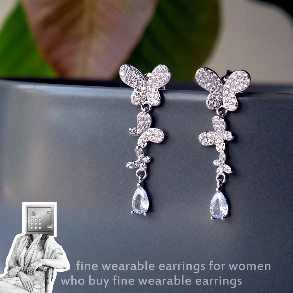 Dazzling butterfly-shaped earrings featuring sparkling stones, perfect for women seeking elegant jewelry.